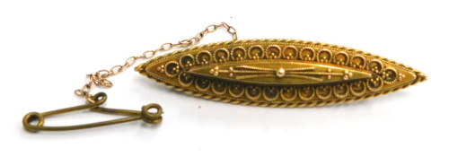 A 15ct gold bar brooch, of marquise design form, with filigree type design, with safety chain, 5cm wide, 4.9g all in, boxed.