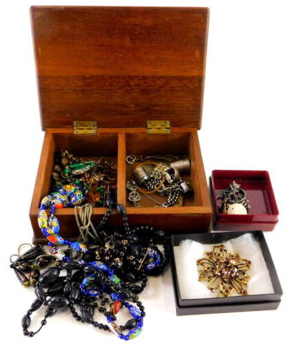 A jewellery box and contents, comprising 18th/19th style necklaces, imitation jet necklace, malachite set silver plated earring, silver thimble, loose coinage, modern brooches, etc. (1 box)