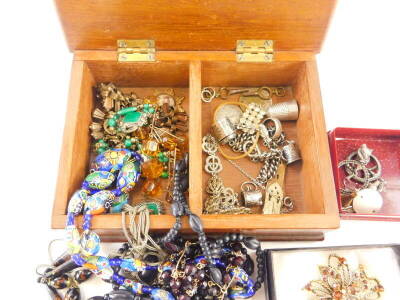 A jewellery box and contents, comprising 18th/19th style necklaces, imitation jet necklace, malachite set silver plated earring, silver thimble, loose coinage, modern brooches, etc. (1 box) - 2