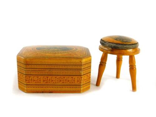 Two items of Mauchline ware, a Clark & Co. Mauchline ware lidded box, with Dumbarton Castle scene of octagonal form profusely decorated with repeat banding of flowers and triangles with inner label and partially fitted interior and a Boston Church stool (