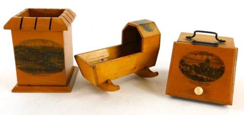 Various early 20thC Mauchline ware, a Bournemouth sycamore money box, 10cm high, Llangollen cradle and Burns monument coal box (3).