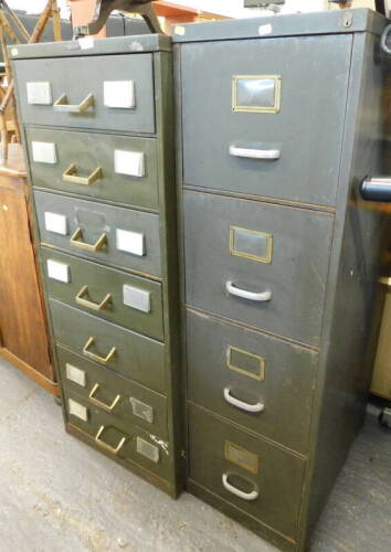 Two green metal filing cabinets.