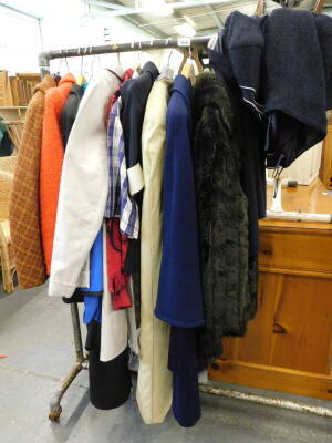 A quantity of ladies clothing, to include a tweed blazer, ladies over coat, faux fur coat, navy blue wool coat, etc. (a quantity)