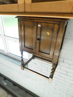 An oak corner cabinet, and an oak side cabinet on barley twist legs, and a stained glass panel. - 2
