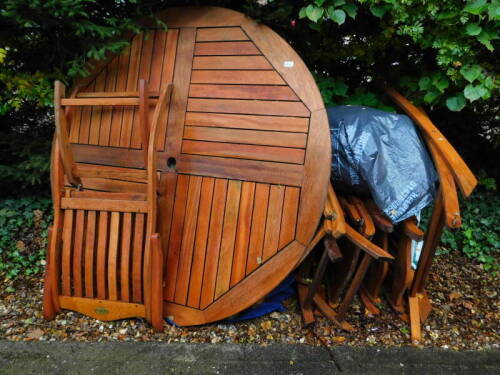 A teak garden table, various folding chairs, etc. (a quantity)