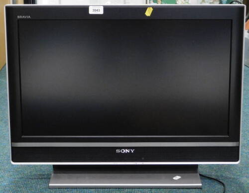 A Sony Bravia 26" LCD digital colour TV, with lead, lacking remote.