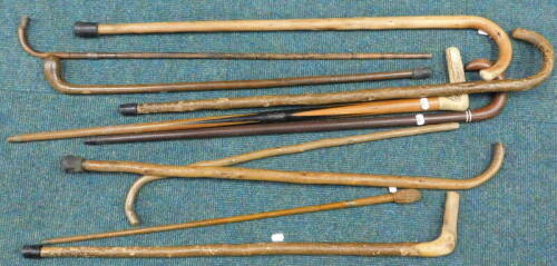 Various walking sticks etc. (a quantity).