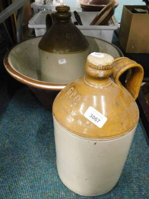 Two stoneware flagons and a large bowl (3).