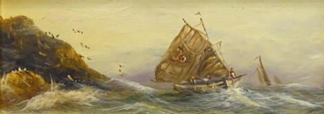 19thC British School. Masted ship off rock coast, oil on board, 12.5cm x 33.5cm.