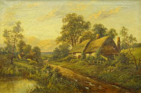 Walter Wallor Caffyn (1845-1898). River scenes with thatched cottages, oil on canvas - pair, signed, 39.5cm x 60cm.