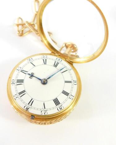 A George III gold pair cased pocket watch, open faced, key wind, white enamel dial bearing Roman and Arabic numerals, fusee verge striking movement by Thomas Mudge & William Dutton, signed and numbered 721, case with rococo pierced foliate decoration, wit