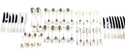 A silver suite of cutlery decorated in the Jesmond pattern, comprising eight dessert and table forks, eight dessert and table knives, eight dessert and soup spoons, eight teaspoons and four table spoons, Sheffield 1994, 126.83oz all in.