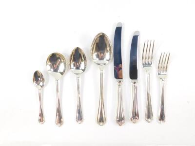 A silver suite of cutlery decorated in the Jesmond pattern, comprising eight dessert and table forks, eight dessert and table knives, eight dessert and soup spoons, eight teaspoons and four table spoons, Sheffield 1994, 126.83oz all in. - 2