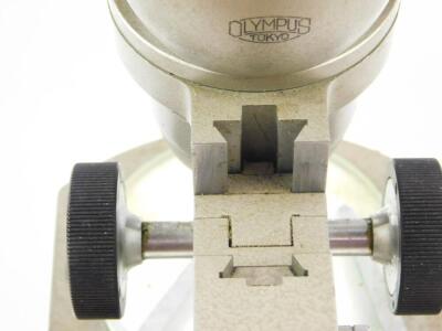 An Olympus binocular microscope VT-II, serial number 218498. - 3