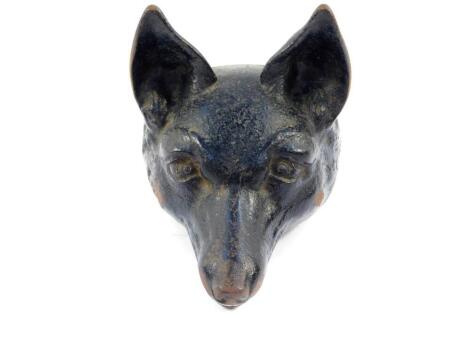 A Victorian cast iron figure of a fox's head, 16cm deep.