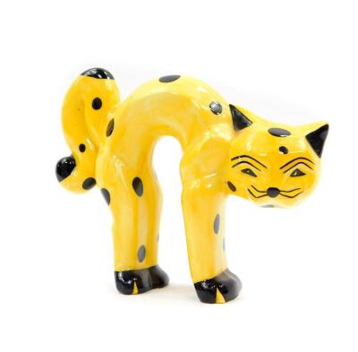 A pair of Lorna Bailey pottery seated cat and dog figures, in red and yellow, printed and painted marks, 12cm high., a seated black and white cat, 14cm high, and a yellow cat arching his back with black spots, 15cm wide. (4) - 2