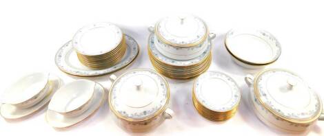 A Noritake porcelain part dinner service decorated in the Chatswood pattern, Contemporary Range, No 3484, comprising a pair of oval meat platters, three vegetable tureens and covers, a pair of sauce boats on integral stands, two salad bowls, ten dinner an