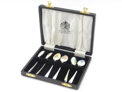 A set of six silver gilt and enamel coffee spoons, painted with flowers against a white guilloche and enamel ground, cased, Elkington & Company, Birmingham 1962, 2.23oz. - 3