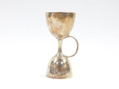 An Edward VII silver double egg cup, of single handled double sized form, presentation engraved, Sheffield 1905, 2.78oz. - 2