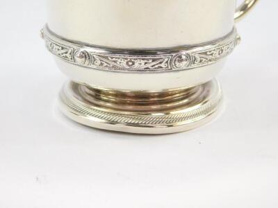 A George VI silver christening tankard, with Celtic band and dragon handle, engraved to 'Philip'., Adie Bros, Birmingham 1950., 5.24oz. - 2