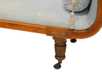 A late Regency mahogany and brass inlaid chaise longue, upholstered in turquoise silk fabric, raised on turned legs, on castors, 202cm wide. - 2