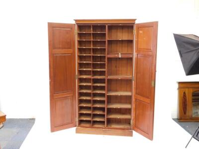 A late Victorian mahogany two door cupboard, fitted with pine stationery dividing shelves with numbered fronts, 100cm wide. - 2