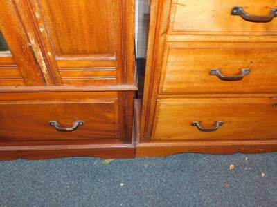 A Victorian carved walnut bedroom pair, comprising single wardrobe, with mirrored door and drawer base, 110cm wide, and dressing chest. (2) - 4