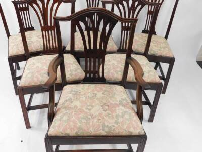 A set of six George III mahogany dining chairs, including carver, with Hepplewhite style pierced vase splats, drop in seats, H frame stretchers and moulded legs. - 2