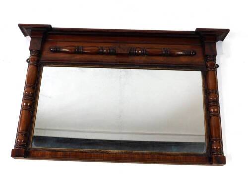 A Victorian mahogany overmantel mirror, with turned columns, enclosing a reeded slip rectangular plate, 63cm high, 98cm wide.