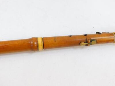 A 19thC boxwood and ivory bound flute by Metzler & Company, Great Marlborough St, London, No 37, 60.5cm wide. - 3