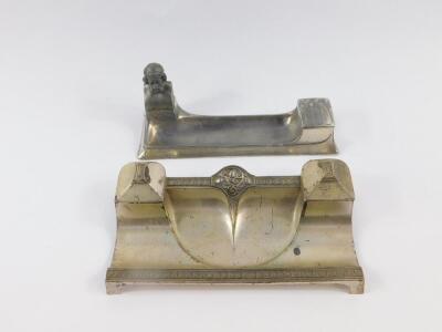 A WMF desk stand, early 20thC, of rectangular form, mounted with a bust of Homer, the inkwell with a hinged Gothic tracery lid, white metal, impressed marks, 22.5cm long.