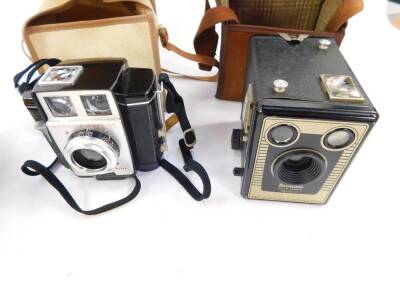 A Kodak Brownie Twin 20 camera outfit, boxed, together with a Brownie Twin 20 camera, and a Brownie Six - 20 camera, model C, both cased. (3) - 3