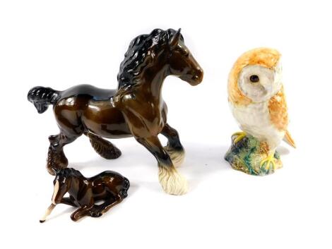 A Beswick pottery figure of a Barn Owl No 1046, printed and impressed marks, together with a Beswick brown gloss horse, and a Beswick foal. (3)