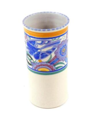 A Carter Stabler Adams Poole Pottery vase, of cylindrical form, traditionally painted with swallows and flowers, painted and seal mark, 14cm high.