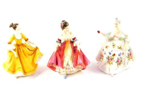 Three Royal Doulton figures, comprising Southern Belle HN2229., Diana HN2468., and Stephanie HN2807.