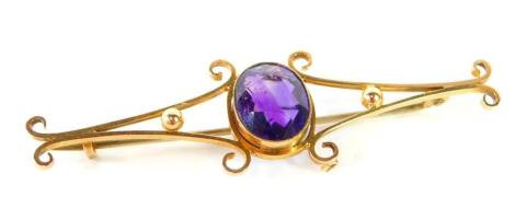 A 9ct gold and amethyst bar brooch, the oval cut amethyst approx 3cts, 4.0g.