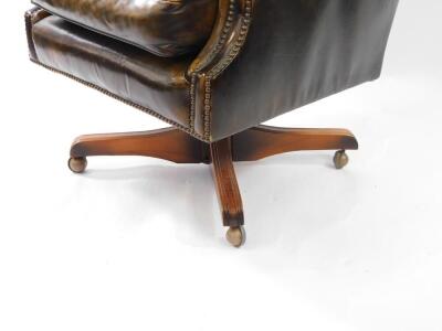 A Georgian style studded and button back leather swivel desk chair. - 3