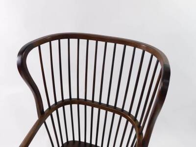 A Victorian stained beech wing high back Windsor chair, by Druce & Co, London, with crook arms, and spindle uprights, H frame turned stretcher, 54cm over arms. - 3