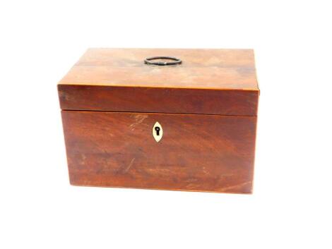 A George III mahogany tea caddy, of rectangular section with boxwood line inlay, the hinged lid opening to reveal a single compartment and recess for a mixing bowl, bone key escutcheon and silver carrying handle, hall marked London 1800, 15cm high, 24cm w