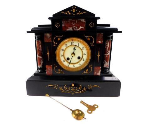 A Victorian slate and marble mantel clock, Boston Retailer, circular cream enamel dial bearing Arabic numerals, French eight day movement with coil strike, dated 1878, the case of architectural form with twin columns and gilt detailing, with key, 31cm hig