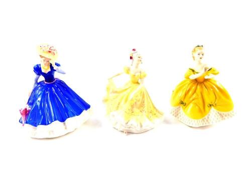 Three Royal Doulton figures, comprising The Last Waltz HN2315, Ninette HN2379, and Mary, Figure of The Year 1992, HN3375.