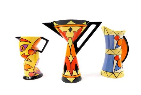 A Lorna Bailey pottery jug decorated in the Harmony pattern, 21.5cm high, further jug geometrically decorated, limited edition 150/200, 20cm high, and a character jug, limited edition 15/50, 17cm high. (3)