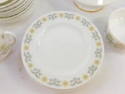 A Paragon porcelain coffee service decorated in the Fiona pattern, comprising coffee pot, cream jug, sugar bowl, ten cups, eleven saucers and ten tea plates. - 2