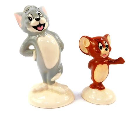 A pair of Beswick pottery figures modelled as Tom & Jerry, printed marks.