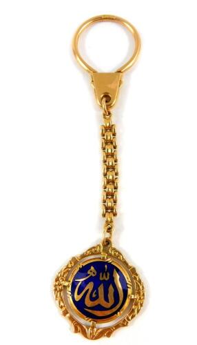 A Middle Eastern 18ct gold and blue enamel fob on chain, 12.3g.