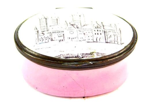 A Bilston enamel late 18thC patch box, pink ground, the hinged lid decorated with 'A Trifle From Lincoln'., illustrating Lincoln Cathedral, 5cm wide.