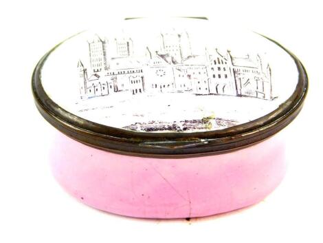 A Bilston enamel late 18thC patch box, pink ground, the hinged lid decorated with 'A Trifle From Lincoln'., illustrating Lincoln Cathedral, 5cm wide.