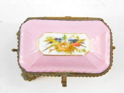 A Paris late 19thC porcelain miniature casket, with foiled brass mounts, reserve painted to the lid with a pair of swallows and a nest, against a pink ground, printed marks, 8cm wide. - 2