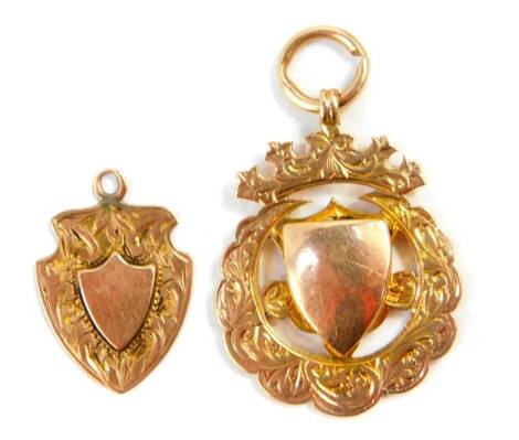 Two 9ct gold shield medallions, 8.0g.