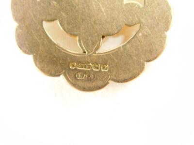 Two 9ct gold shield medallions, 8.0g. - 2